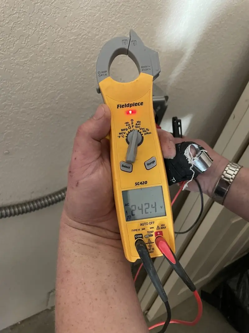 Voltage testing with clamp meter during Hot Tub / Pool Electrical Wiring in Charles City